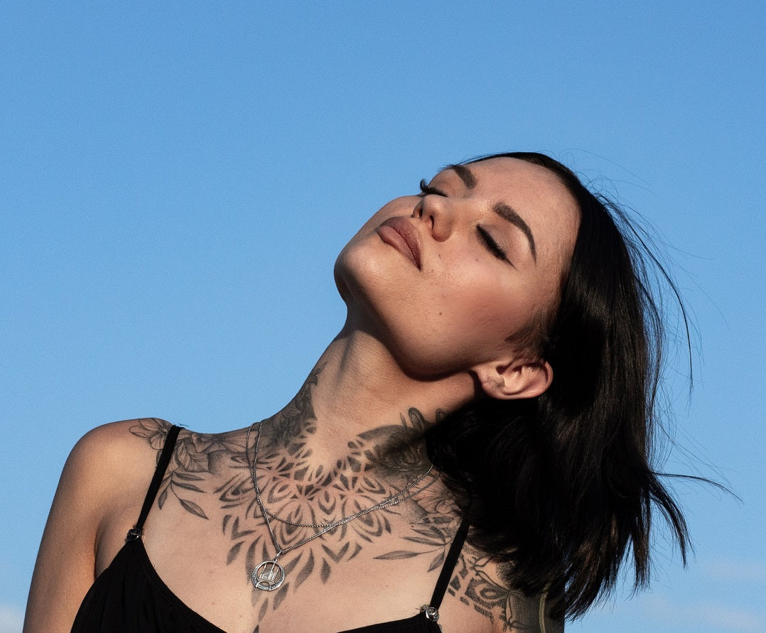 Tan Ink Tattoo