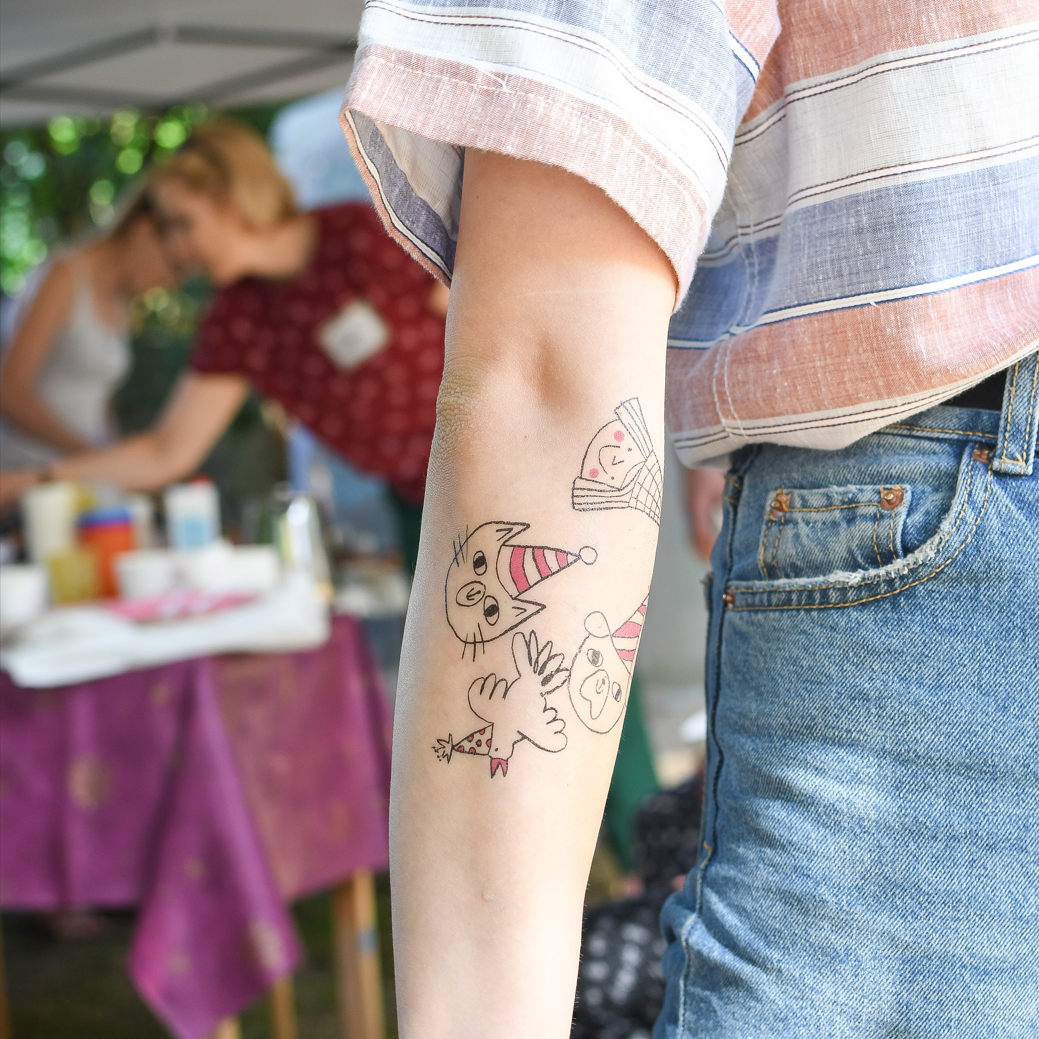 Female tattoo artist working